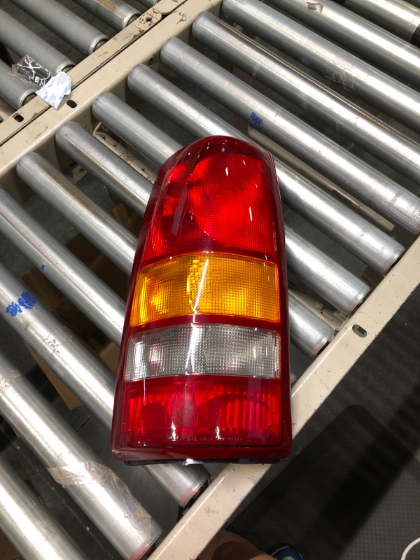 Photo 2 of TYC Left Tail Light Assembly Compatible with 1999-2002 Chevrolet Silverado Driver