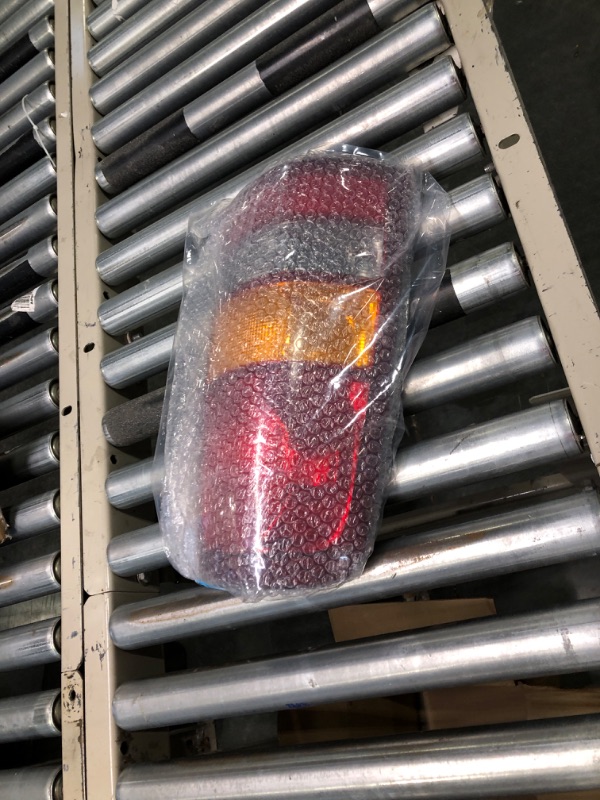 Photo 4 of TYC Left Tail Light Assembly Compatible with 1999-2002 Chevrolet Silverado Driver