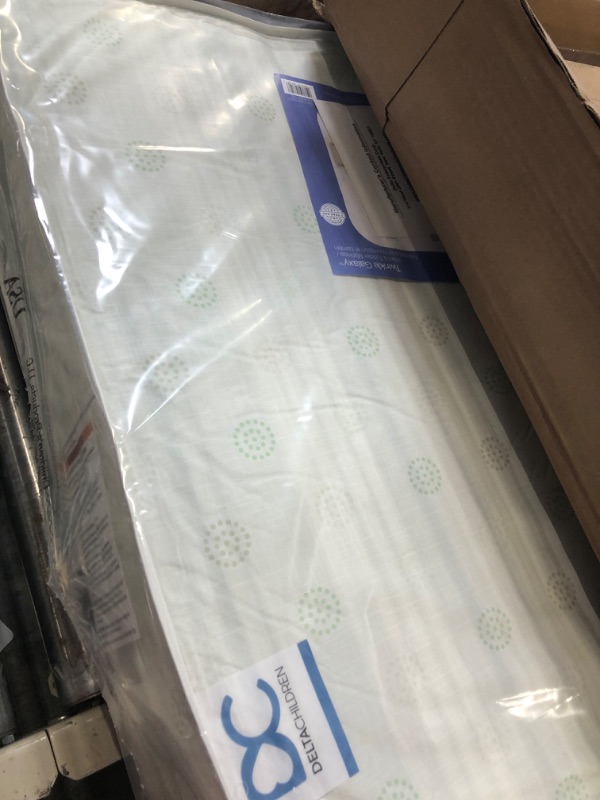Photo 1 of Delta Children Twinkle Galaxy Dual Sided Crib and Toddler Mattress - Premium Sustainably Sourced Fiber Core - Waterproof - GREENGUARD Gold Certified (Non-Toxic) - 7 Year Warranty - Made in USA