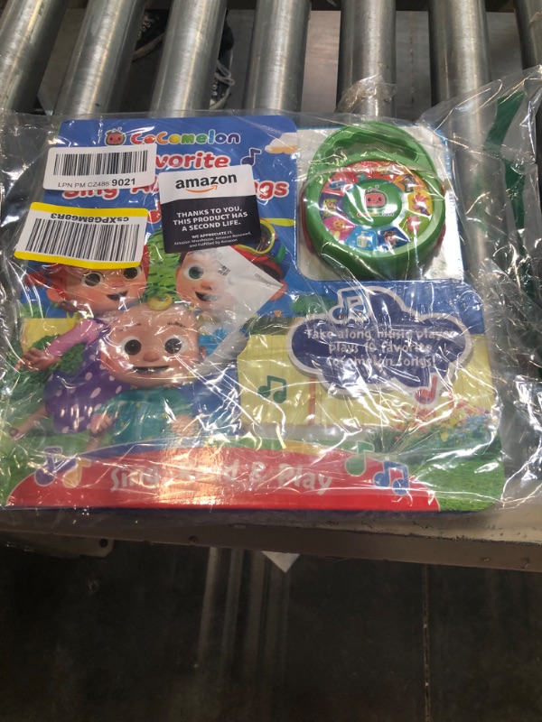 Photo 1 of CoComelon Favorite Sing-Along Songs - Children's Deluxe Music Player Toy and Board Book Set, Ages 1-5