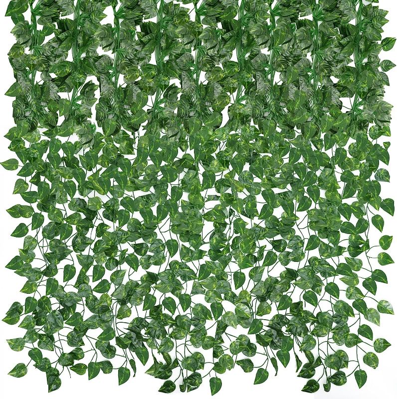 Photo 1 of  Artificial Ivy Greenery Garland, Fake Vines Hanging Plants Backdrop for Room Bedroom Wall Decor, Green Leaves for Jungle Theme Christmas Party Wedding Decoration