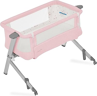 Photo 1 of Dream On Me Skylar Bassinet and Beside Sleeper in Pink, Lightweight and Portable Baby Bassinet, Five Position Adjustable Height, Easy to Fold and Carry Travel Bassinet, JPMA Certified