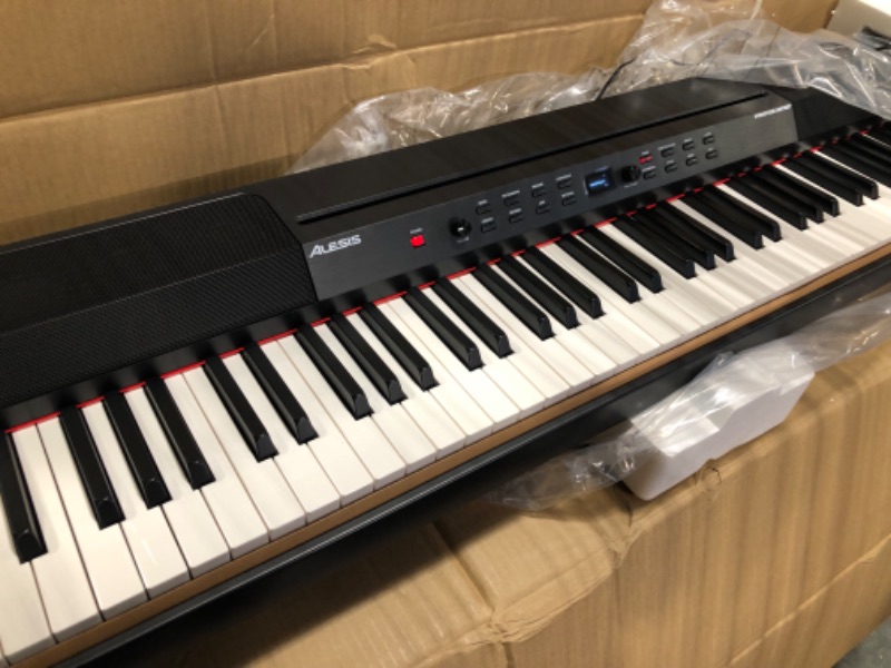 Photo 1 of Alesis Prestige Artist - 88 Key Digital Piano with Full Size Graded Hammer Action Weighted Keys, Multi-Sampled Sounds, Speakers, FX and 256 Polyphony Prestige Artist Piano Only