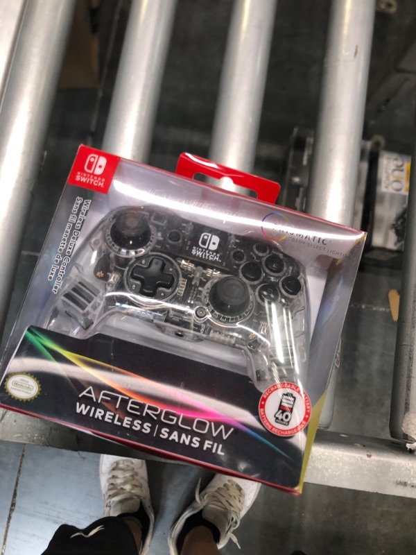 Photo 1 of Afterglow LED Wireless Deluxe Gaming Controller - Licensed by Nintendo for Switch and OLED - RGB Hue Color Lights - See through Gamepad Controller - Paddle Buttons