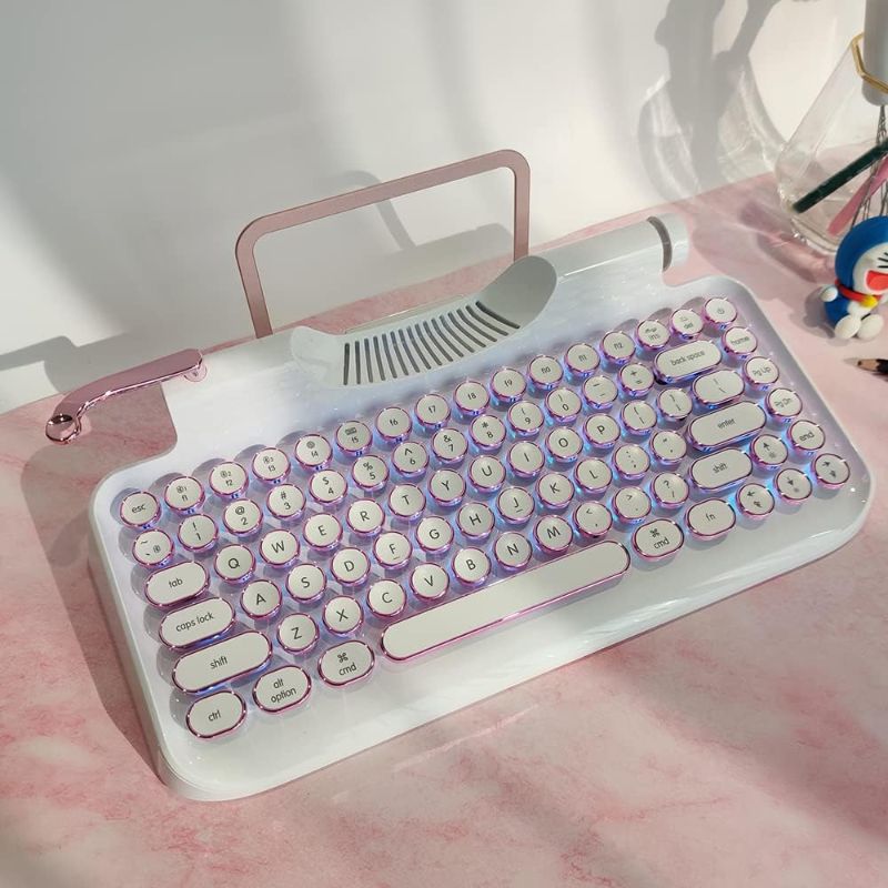 Photo 1 of 
KNEWKEY RYMEK Typewriter Style Mechanical Wired & Wireless Keyboard with Tablet Stand, Bluetooth Connection (pink)