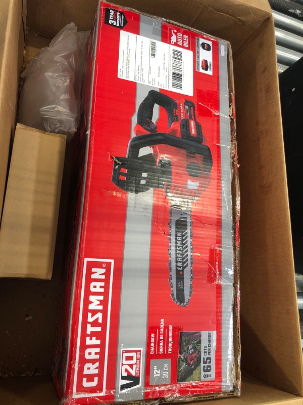 Photo 2 of Craftsman V20* Cordless Chainsaw, 12-Inch (CMCCS620M1) and V20* Lithium Ion Battery, 2.0-Amp Hour (CMCB202)