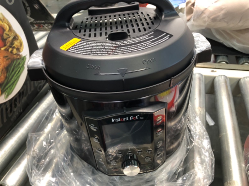 Photo 1 of Instant Pot Pro 10-in-1 Pressure Cooker, Slow Cooker, Rice/Grain Cooker, Steamer, Sauté, Sous Vide, Yogurt Maker, Sterilizer, and Warmer, Includes Free App with over 1900 Recipes, Black, 8 Quart
