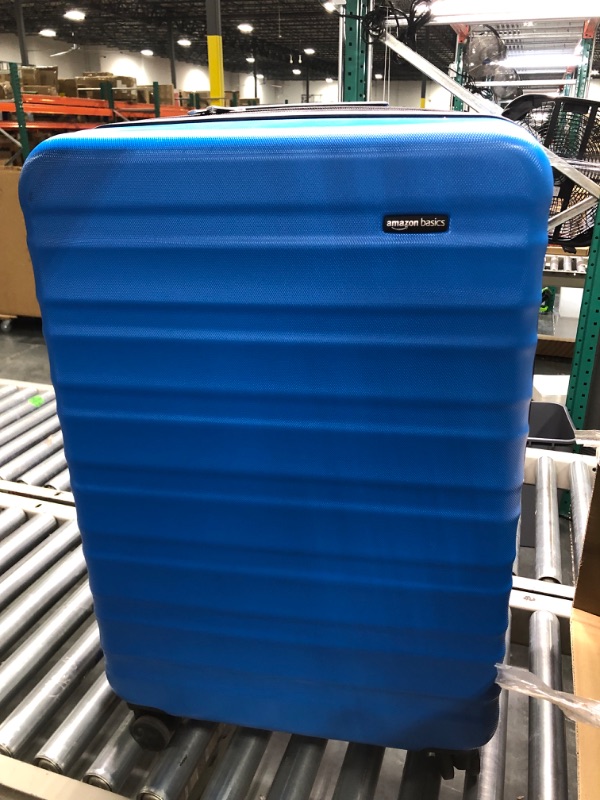 Photo 1 of Amazon Basics 30-Inch Hardside Spinner, Blue Blue 30-inch Spinner