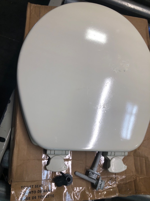 Photo 2 of CHURCH 540EC 006 Toilet Seat with Easy Clean & Change Hinge, ROUND, Durable Enameled Wood, Bone