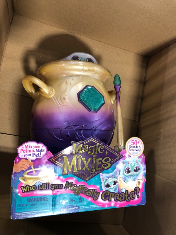 Photo 2 of Magic Mixies Magical Misting Cauldron with Interactive 8 inch Blue Plush Toy and 50+ Sounds and Reactions, Multicolor