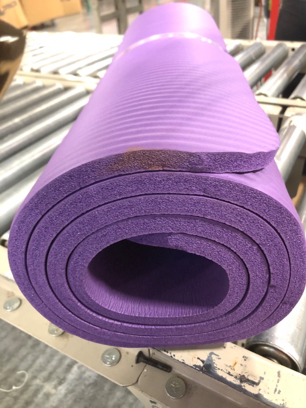 Photo 4 of Amazon Basics Extra Thick Exercise Yoga Gym Floor Mat with Carrying Strap - 74 x 24 x .5 Inches, Purple & High-Density Round Foam Roller for Exercise and Recovery - 36 Inch, Black