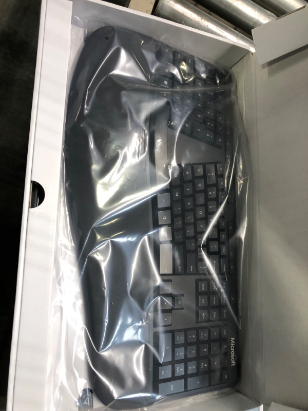 Photo 5 of Microsoft Ergonomic Keyboard - Black. Wired, Comfortable, Ergonomic Keyboard with Cushioned Wrist and Palm Support. Split Keyboard. Dedicated Office Key.