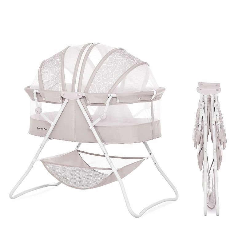 Photo 1 of Dream On Me Karley Bassinet in Cool Grey, Lightweight Portable Baby Bassinet, Quick Fold and Easy to Carry , Adjustable Double Canopy, Indoor and Outdoor Bassinet with Large Storage Basket.
