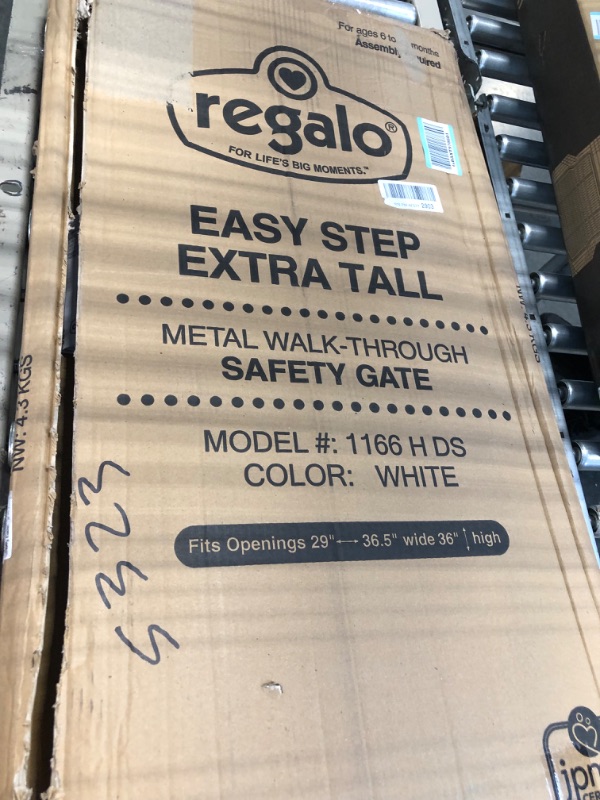 Photo 2 of Regalo Easy Step 36" Extra Tall Walk Thru Baby Gate, Includes 4-Inch Extension Kit, 4 Pack of Pressure Mount Kit and 4 Pack Wall Cups and Mounting Kit, Pack of 1 White