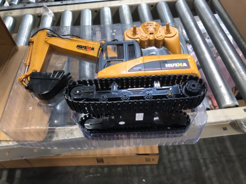 Photo 3 of fisca Remote Control Excavator RC Construction Vehicles 2.4Ghz 15 Channel Full Function Digger Toys with Simulation Sound and Flashing Lights