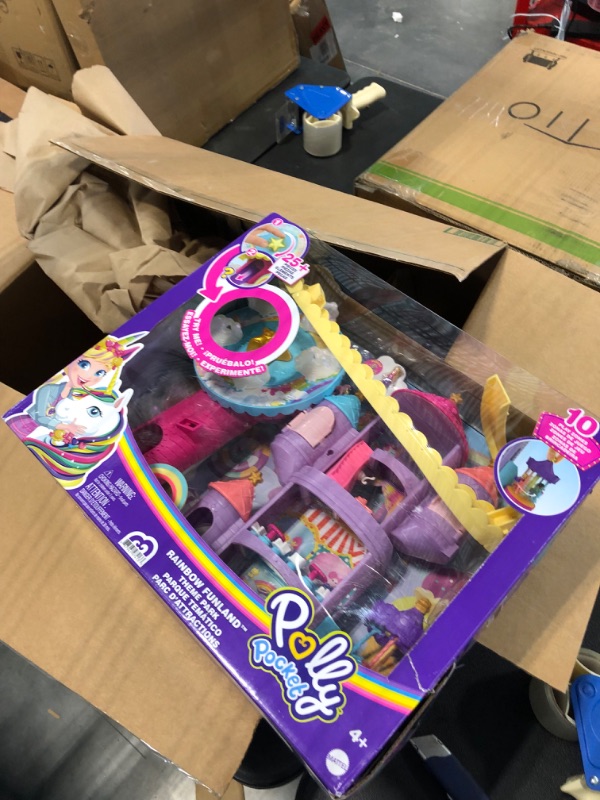Photo 1 of olly Pocket Rainbow Funland Theme Park, 3 Rides, 7 Play Areas, Polly and Shani Dolls, 2 Unicorns & 25 Surprise Accessories (30 Total Play Pieces), Great Gift for Ages 4 Years Old & Up