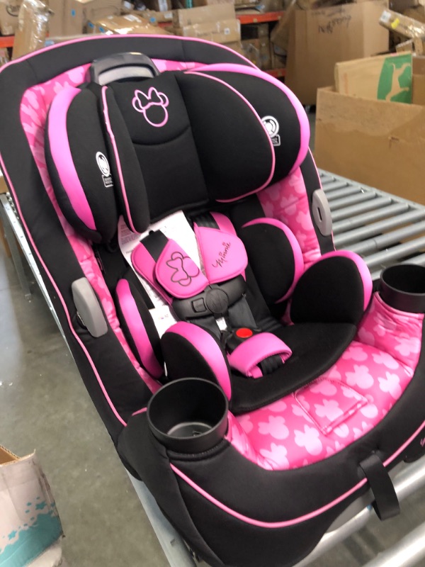 Photo 1 of Disney Baby Grow and Go All-in-One Convertible Car Seat, Rear-facing 5-40 pounds, Forward-facing 22-65 pounds, and Belt-positioning booster 40-100 pounds, Simply Minnie