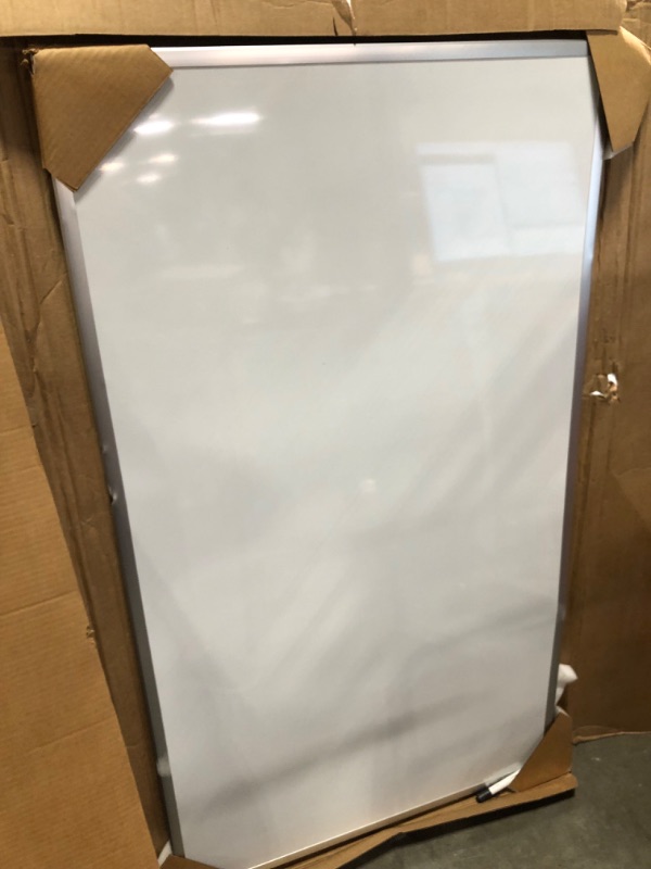 Photo 8 of Quartet Whiteboard, Dry Erase Board, Magnetic, 5' x 3', Nano-Clean Surface Resists Ink Stains, Accessory Tray and 1 Dry Erase Marker, Silver Aluminum Frame (SM535) **Minor dings and dent**
