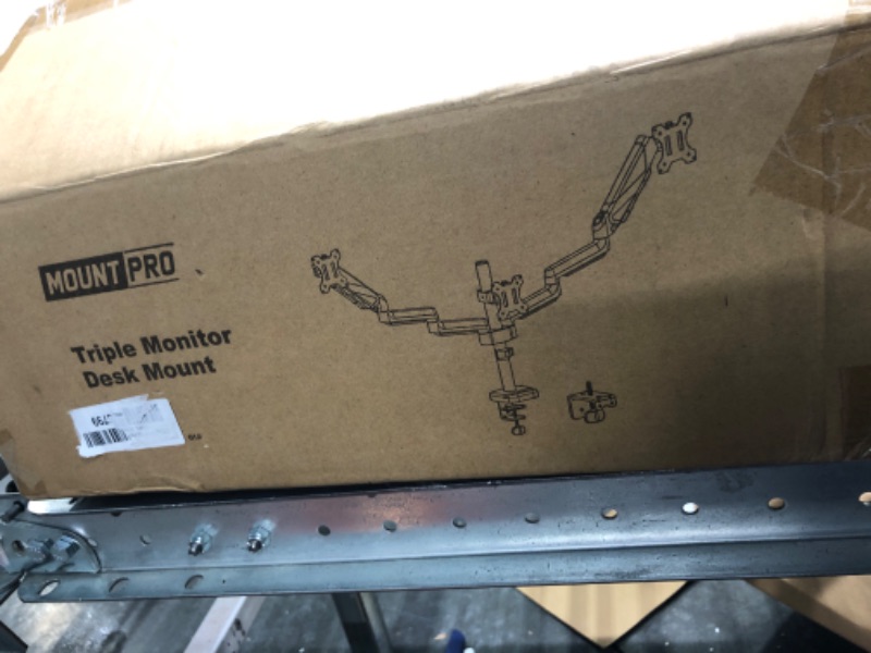 Photo 1 of MOUNT PRO Triple Monitor Desk Mount - Articulating Gas Spring Monitor Arm, Removable VESA Mount Desk Stand with Clamp and Grommet Base - Fits 13 to 27 Inch LCD Computer Monitors, VESA 75x75, 100x100