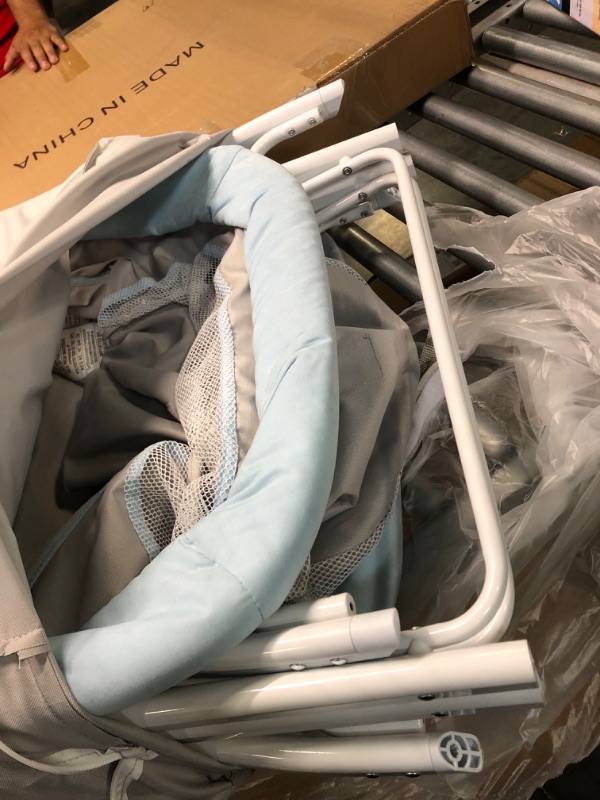 Photo 1 of Dream On Me Traveler Portable Bassinet in Starlight Blue, Lightweight and Breathable Mesh Design, Easy to Clean and Fold Baby Bassinet - Carry Bag Included