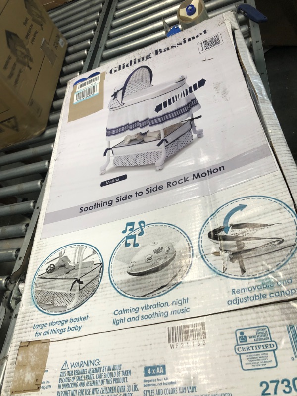 Photo 1 of Delta Children Smooth Glide Bedside Bassinet - Portable Crib with Lights, Sounds and Vibrations, Marina