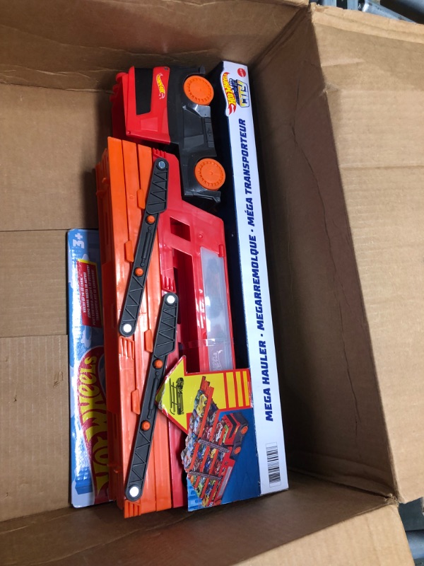 Photo 2 of Hot Wheels Mega Hauler with Storage for up to 50 1:64 scale cars ages 3 and older 50th Anniversary Hot Wheels Graphics