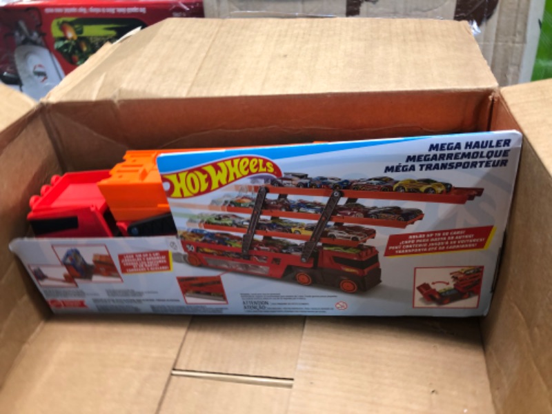 Photo 1 of Hot Wheels Mega Hauler with Storage for up to 50 1:64 scale cars ages 3 and older 50th Anniversary Hot Wheels Graphics