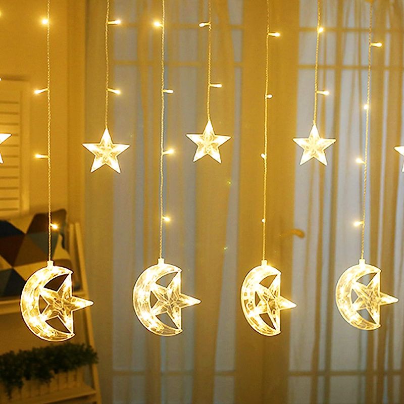 Photo 1 of 
Twinkle Star 138 LED Star Moon Curtain String Lights, 8 Modes Decorations for Ramadan, Christmas, Wedding, Party, Home, Patio Lawn, Warm White (USB Powered)Twinkle Star 138 LED Star Moon Curtain String Lights, 8 Modes Decorations for Ramadan, Christmas, 