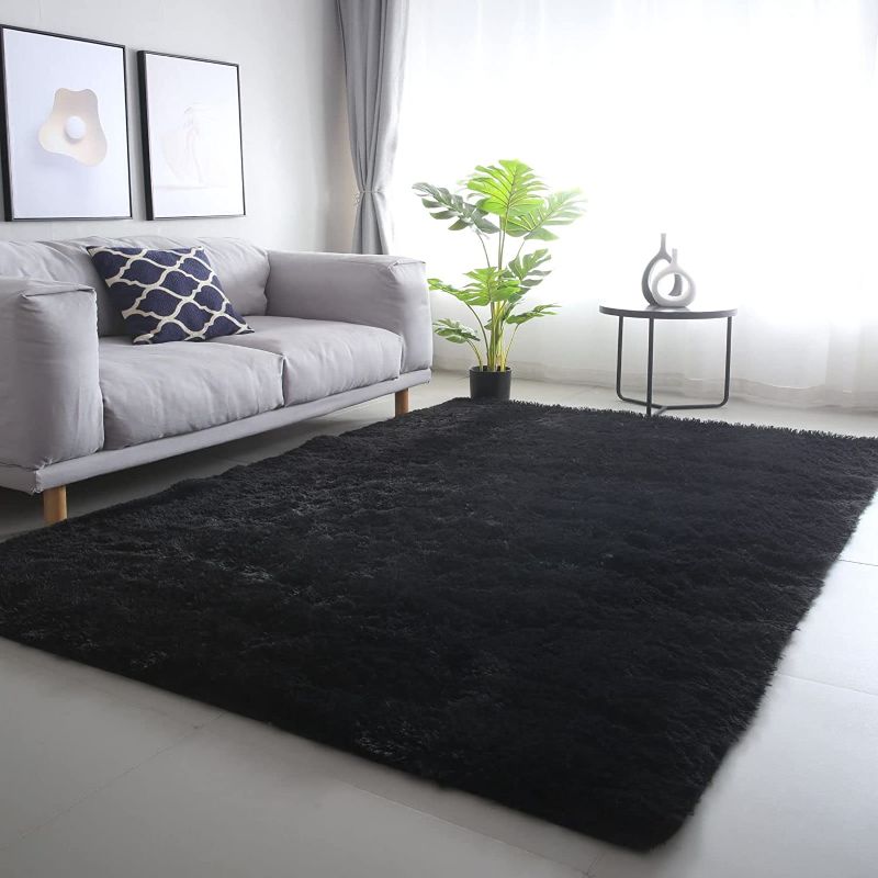 Photo 1 of AIYUECS Shag Area Rug,Indoor Ultra Soft Fluffy Plush Rugs for Bedroom Living Room, Non-Skid Modern Nursery Faux Fur Rugs for Kids Room Home Decor (8x10 Feet, Black)
