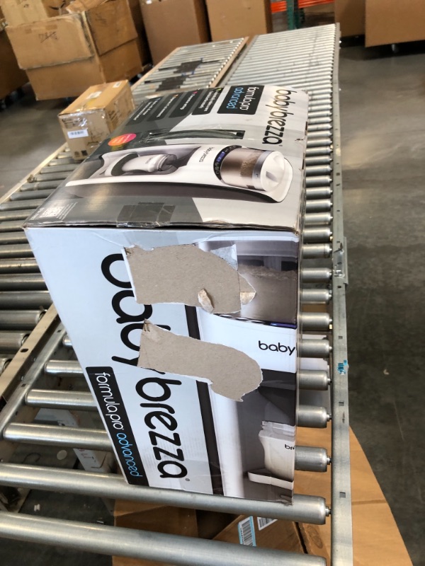 Photo 1 of New and Improved Baby Brezza Formula Pro Advanced Formula Dispenser Machine - Automatically Mix a Warm Formula Bottle Instantly - Easily Make Bottle with Automatic Powder Blending