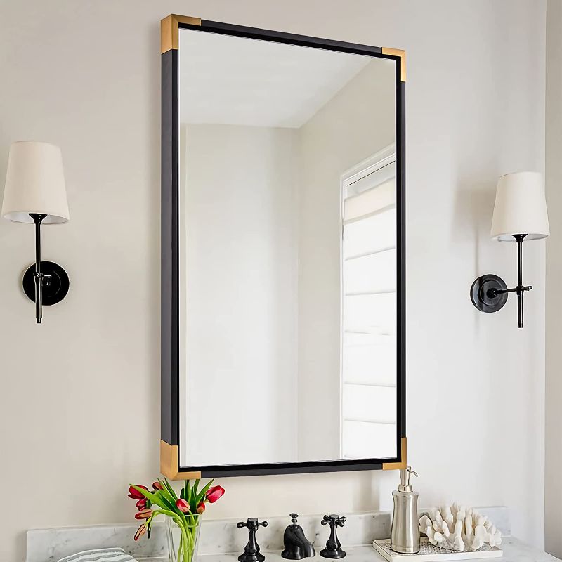 Photo 1 of ANDY STAR Black Mirror, New Zealand Pine Wood Framed Rectangle Mirror with Gold Metal Corner, 24x36” Modern Wall Mirror for Bathroom Vanity Living Room Entryway Hangs Vertical or Horizontal