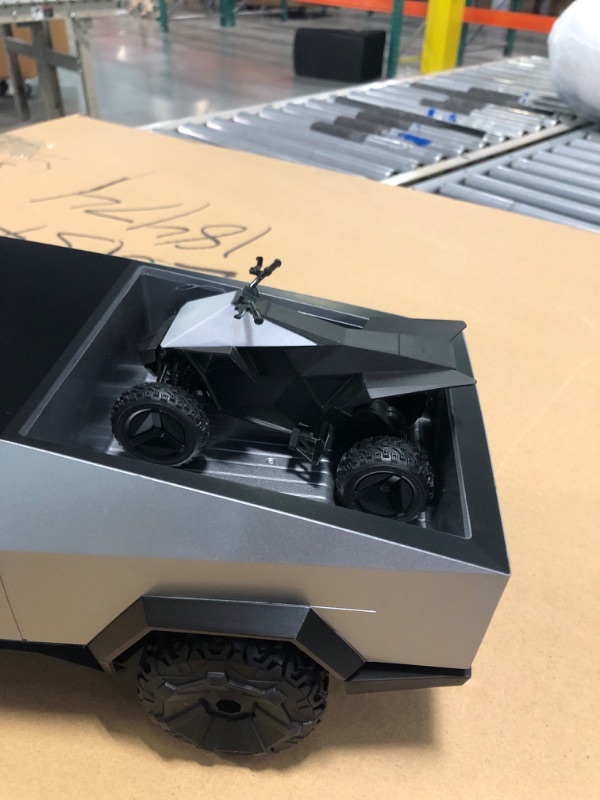 Photo 5 of Hot Wheels RC 1:10 Tesla Cybertruck Radio-Controlled Truck & Electric Cyberquad, Custom Controller, Speeds to 12 MPH, Working Headlights & Taillights, for Kids & Collectors [Amazon Exclusive]