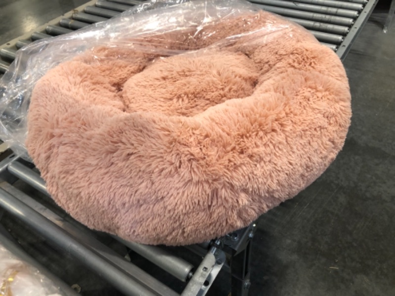 Photo 2 of Bedsure Calming Dog Bed for Medium Dogs - Donut Washable Medium Pet Bed, 30 inches Anti Anxiety Round Fluffy Plush Faux Fur Cat Bed, Fits up to 45 lbs Pets, Pink