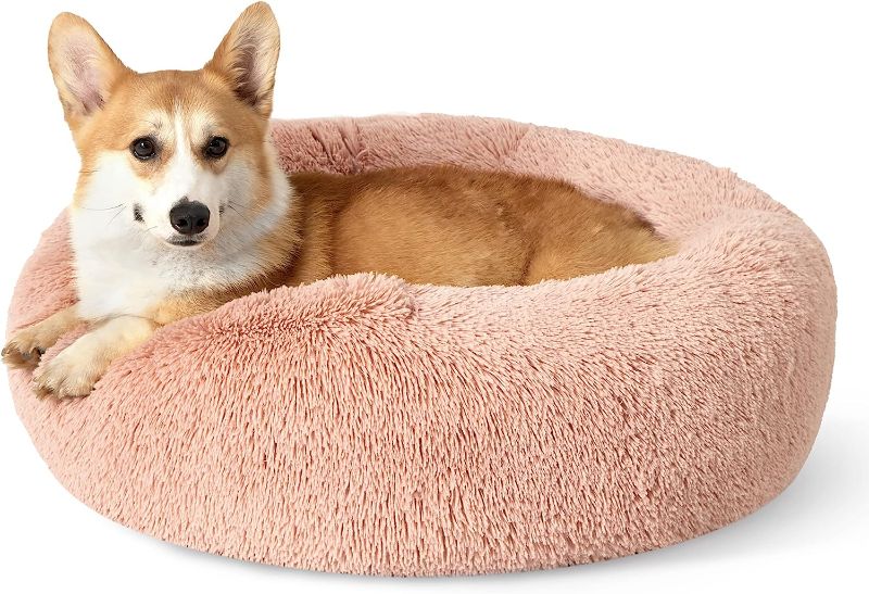 Photo 1 of Bedsure Calming Dog Bed for Medium Dogs - Donut Washable Medium Pet Bed, 30 inches Anti Anxiety Round Fluffy Plush Faux Fur Cat Bed, Fits up to 45 lbs Pets, Pink