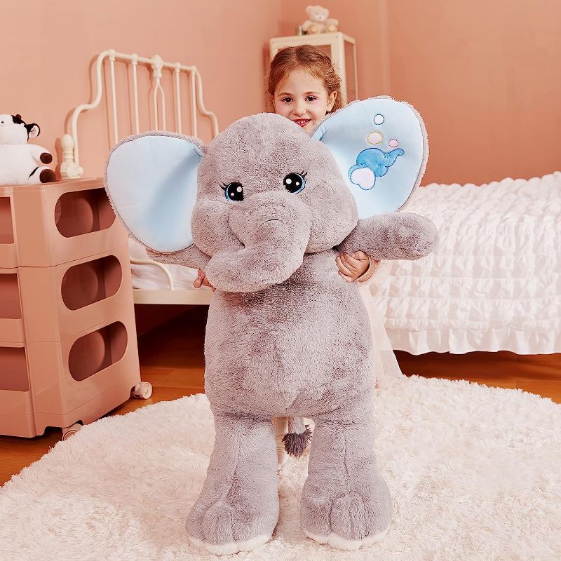 Photo 1 of IKASA Giant Elephant Stuffed Animal Plush Toy,Large Elephant Cute Jumbo Soft Toys,Huge Big Size Fluffy Plushy Fat Oversized Plushie,Gifts for Kids Girls Boy...
