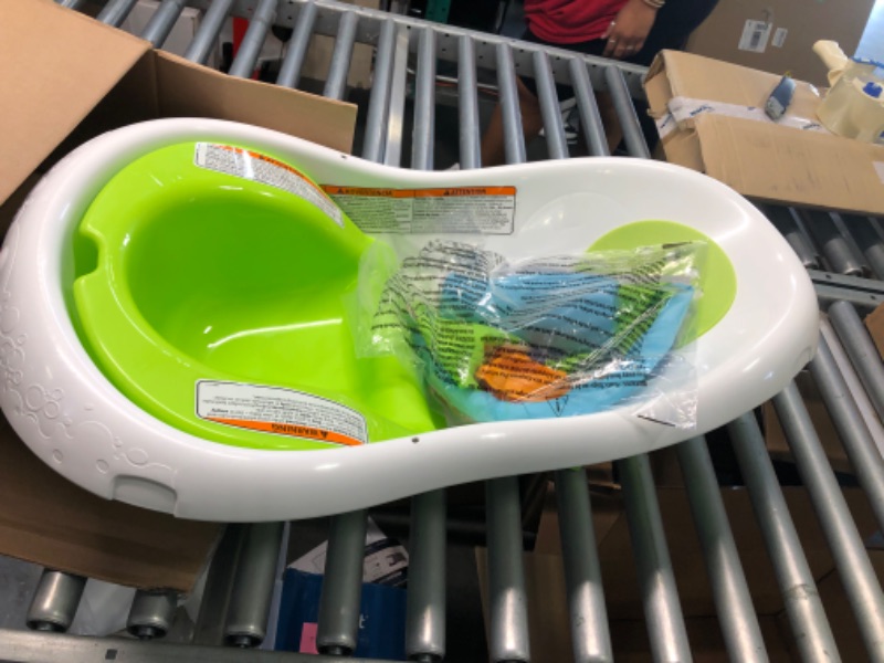 Photo 1 of Fisher-Price Baby Bath Tub, 4-in-1 Newborn to Toddler Tub with Infant Seat Bath Toys and Sling ‘n Seat Tub, Green Green - Frustration Free Package
--- Open Box --- 