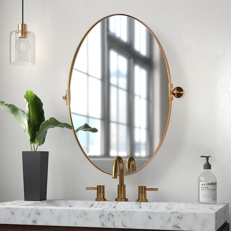 Photo 1 of ANDY STAR Gold Oval Mirror, Oval Pivot Bathroom Mirror, Brushed Gold Oval Pivot Mirror Bathroom Stainless Steel Metal Frame Tilting Vanity Wall Mirror Hangs Vertical
