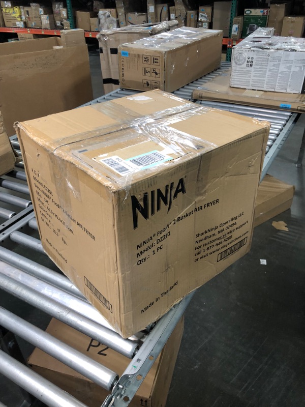 Photo 1 of Ninja DZ201 Foodi 8 Quart 6-in-1 DualZone 2-Basket Air Fryer with 2 Independent Frying Baskets, Match Cook & Smart Finish to Roast, Broil, Dehydrate & More for Quick, Easy Meals, Grey