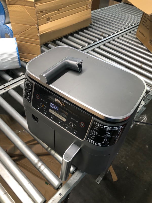 Photo 1 of Ninja DZ201 Foodi 8 Quart 6-in-1 DualZone 2-Basket Air Fryer with 2 Independent Frying Baskets, Match Cook & Smart Finish to Roast, Broil, Dehydrate & More for Quick, Easy Meals, Grey