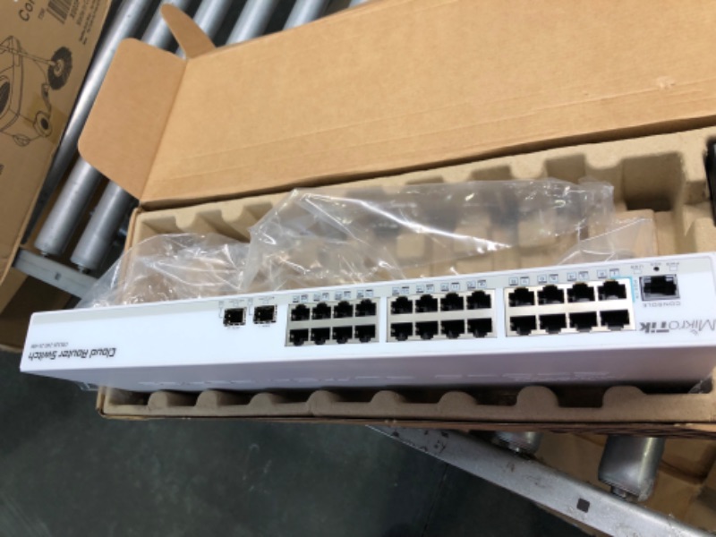Photo 1 of Mikrotik CRS326-24G-2S+RM Cloud Router Switch 326-24G-2S+RM 24 Gigabit port switch with 2 x SFP+ cages in 1U rackmount case, Dual boot (RouterOS or SwitchOS)