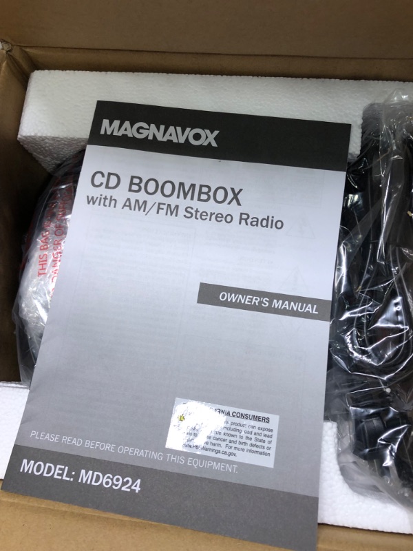 Photo 4 of Magnavox MD6924 Portable Top Loading CD Boombox with AM/FM Stereo Radio in Black | CD-R/CD-RW Compatible | LED Display | AUX Port Supported | Programmable CD Player |