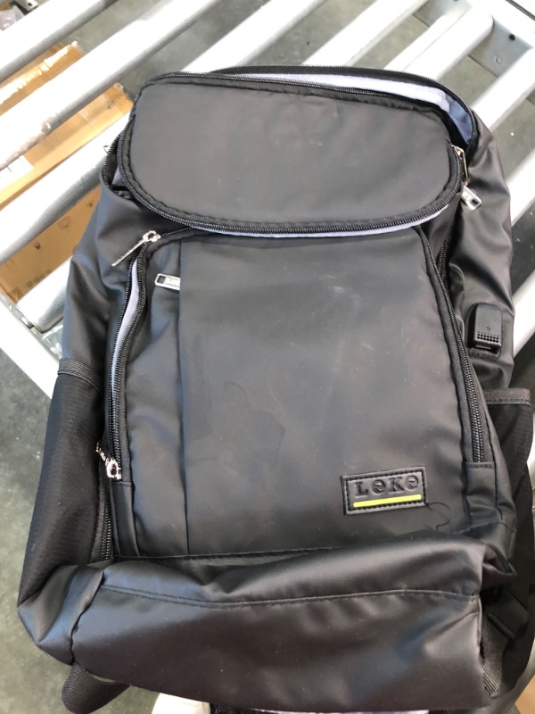 Photo 1 of Black Leather Backpack With Stand On Wheels 