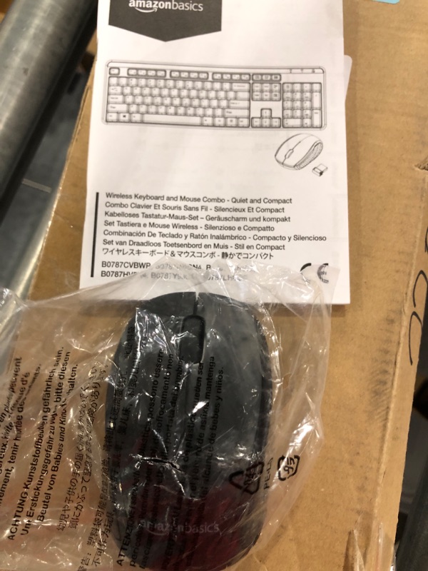 Photo 4 of Amazon Basics Wireless Computer Keyboard and Mouse Combo - Quiet and Compact - US Layout (QWERTY)