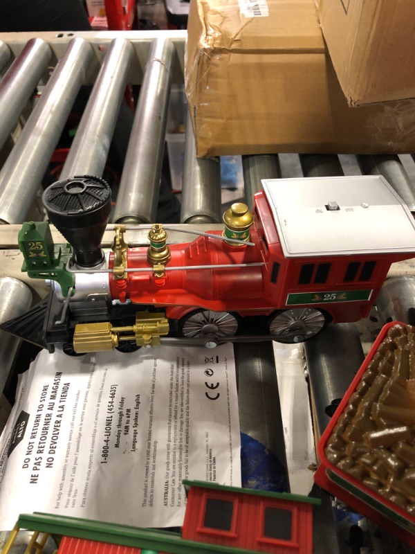 Photo 1 of Lionel North Pole Central Battery-Powered Train Set with Remote + Inner Loop Track Expansion Pack Complete Set + Expansion Track (Inner Loop)