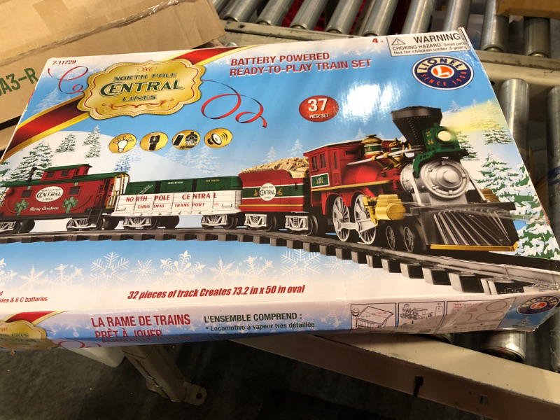 Photo 1 of Lionel North Pole Central Battery-Powered Train Set with Remote + Inner Loop Track Expansion Pack Complete Set + Expansion Track (Inner Loop)