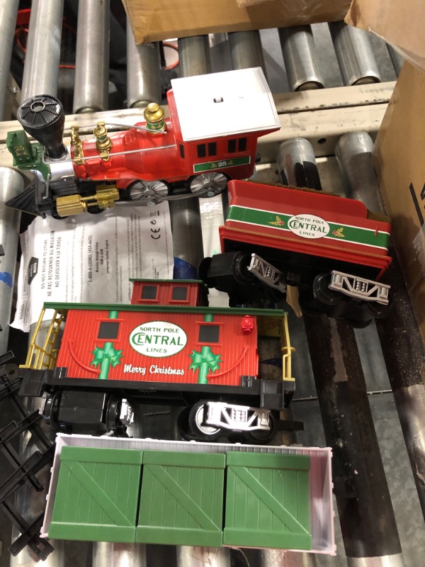 Photo 1 of Lionel North Pole Central Battery-Powered Train Set with Remote + Inner Loop Track Expansion Pack Complete Set + Expansion Track (Inner Loop)
