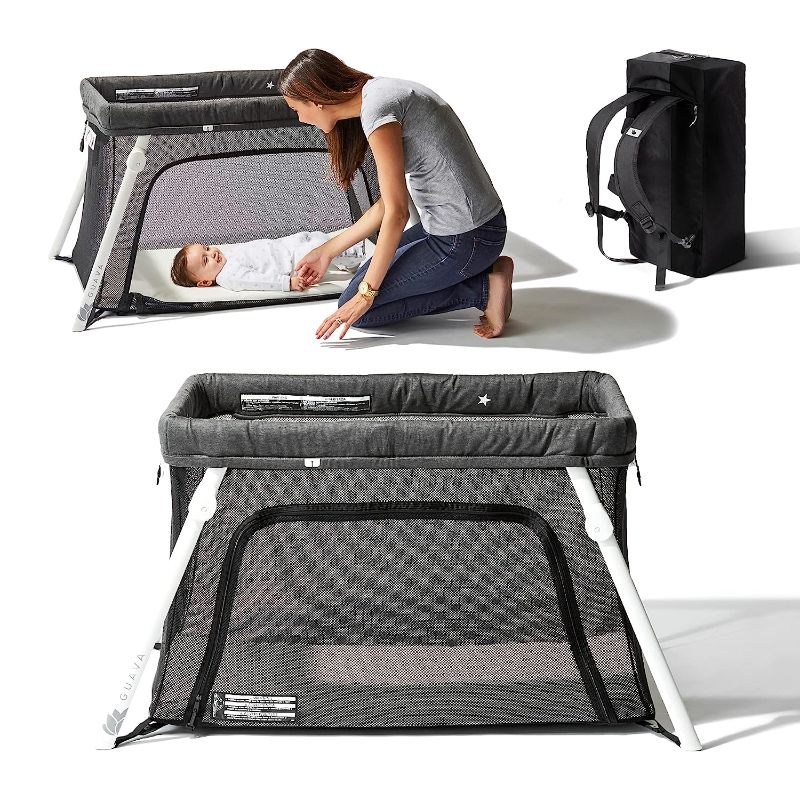 Photo 1 of Lotus Travel Crib - Backpack Portable, Lightweight, Easy to Pack Play-Yard with Comfortable Mattress - Certified Baby Safe