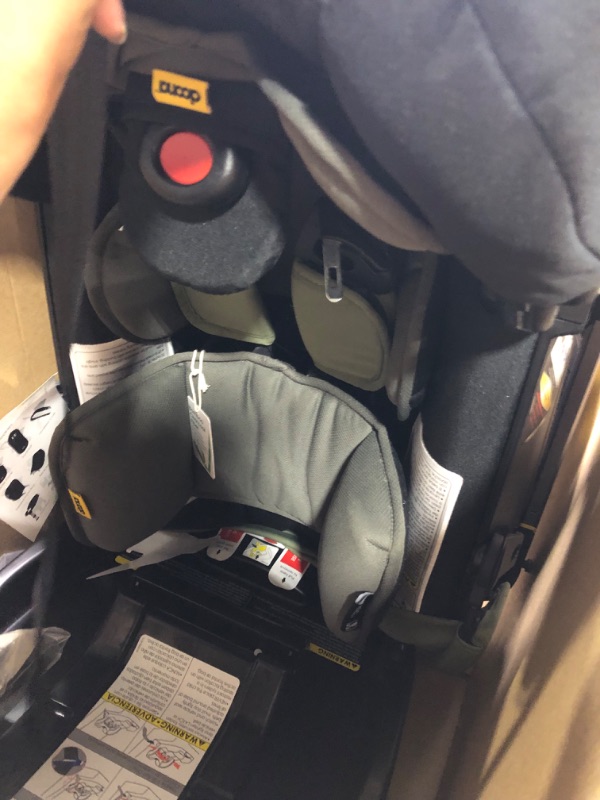 Photo 3 of Doona Infant Car Seat & Latch Base - Rear Facing ,Car Seat to Stroller in Seconds - US Version, Desert Green