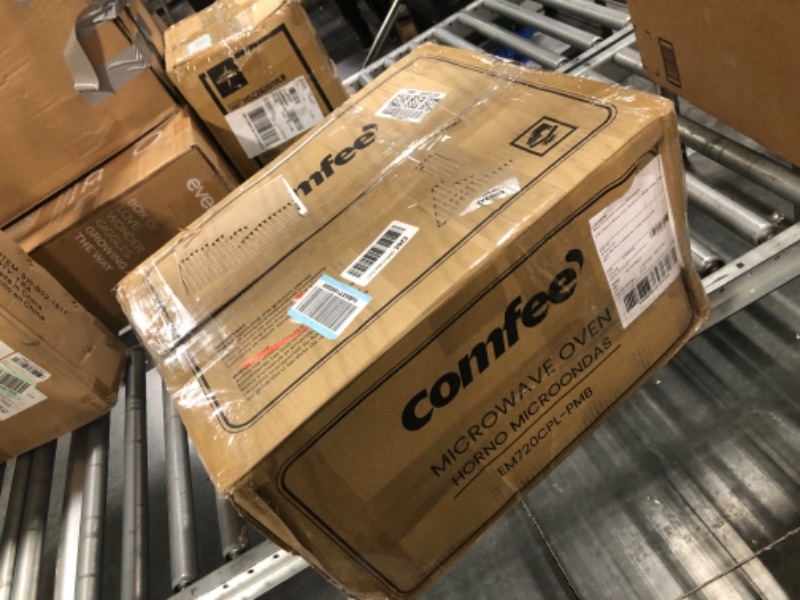 Photo 1 of COMFEE' EM720CPL-PMB Countertop Microwave Oven with Sound On/Off, ECO Mode and Easy One-Touch Buttons, 0.7cu.ft, 700W, Black Black Microwave