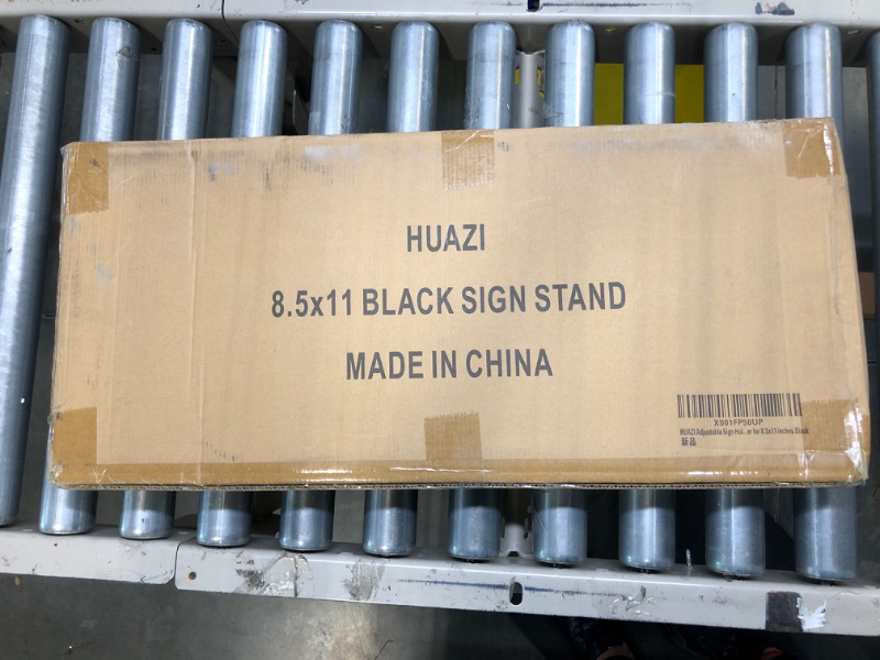 Photo 1 of HUAZI Adjustable Sign Holder Standing Floor Sign Stand for 8.5x11 inches,Both Vertical & Horizontal View Displayed,Snap-Open Frame with Safety Corner for School Church Business Show,Black 8.5 x 11 inches,Black